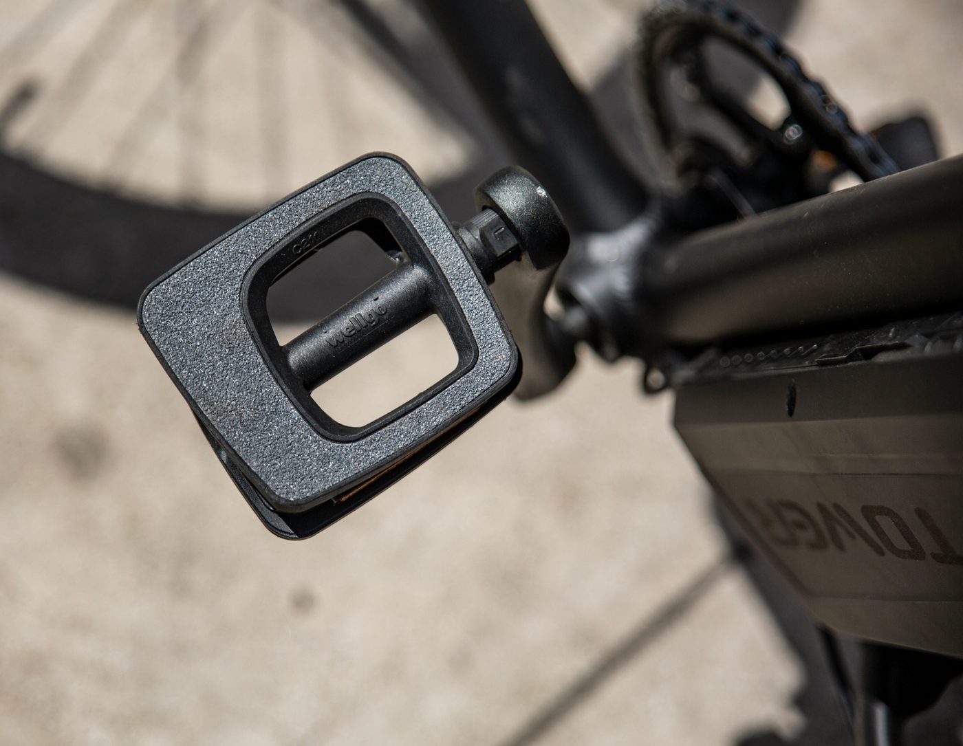 Rear rack detail showing a practical utility-carrying setup on an e-bike
