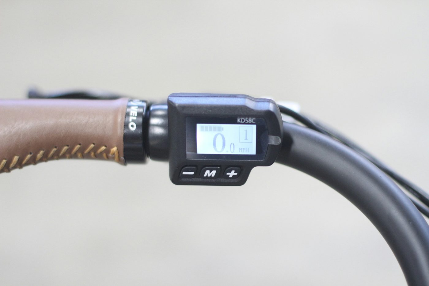 Close-up of a simple e-bike display and controls